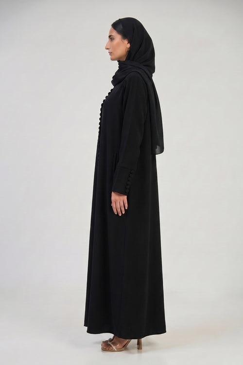 Pearl Button-Front Black Abaya with Elegant Panel Design – hover image