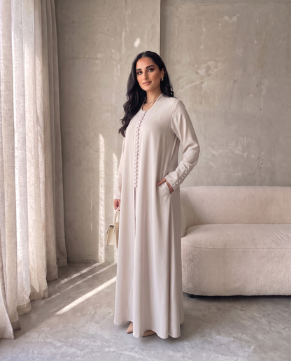 Pearl Button-Front Beige Abaya with Elegant Panel Design