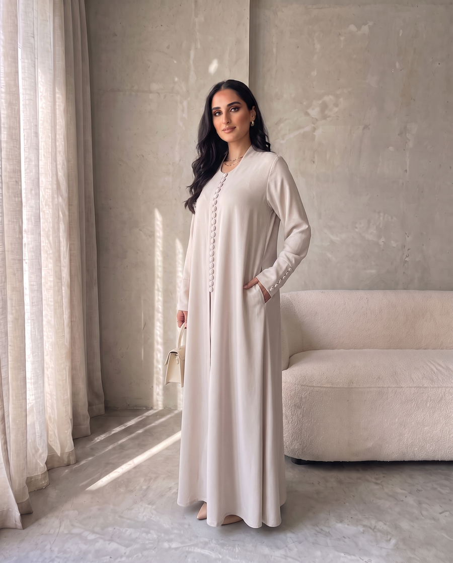 Pearl Button-Front Beige Abaya with Elegant Panel Design