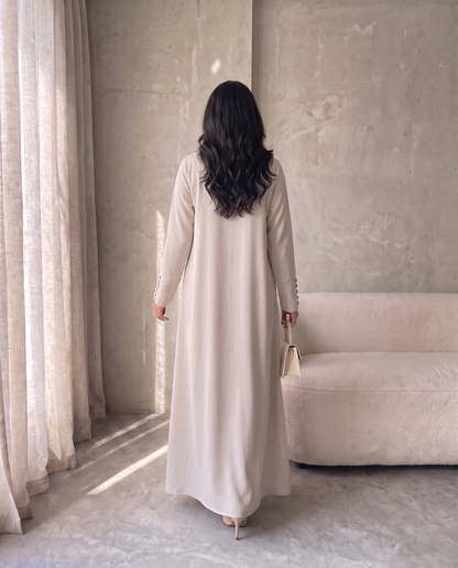 Pearl Button-Front Beige Abaya with Elegant Panel Design