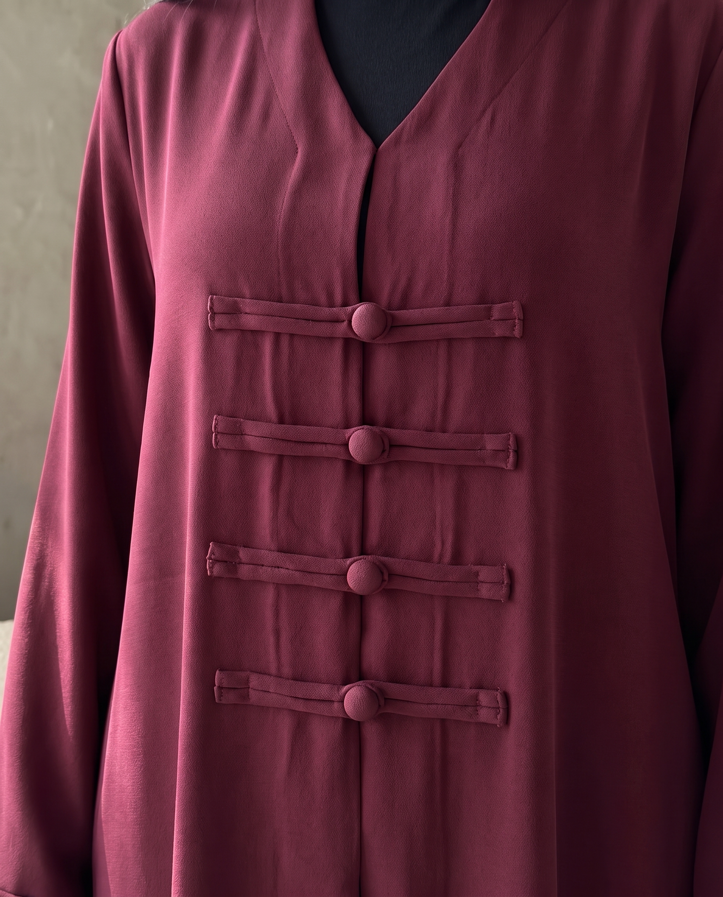 Elegant Maroon Abaya with Structured Front Panel Button Design
