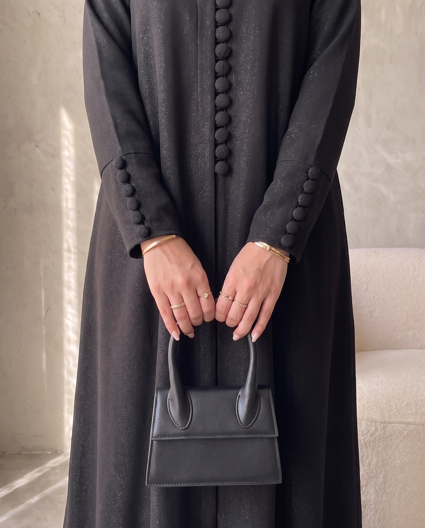 Pearl Button-Front Black Abaya with Elegant Panel Design