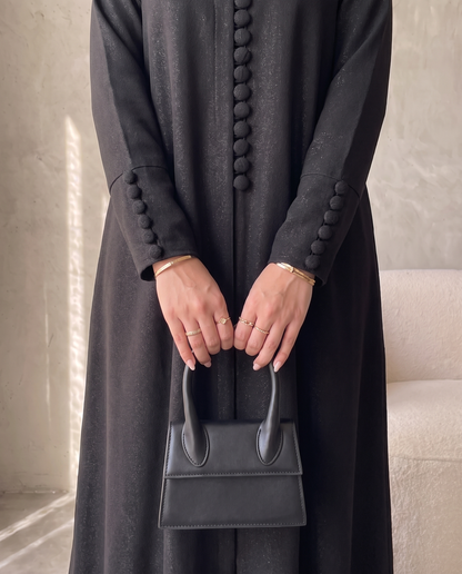 Pearl Button-Front Black Abaya with Elegant Panel Design