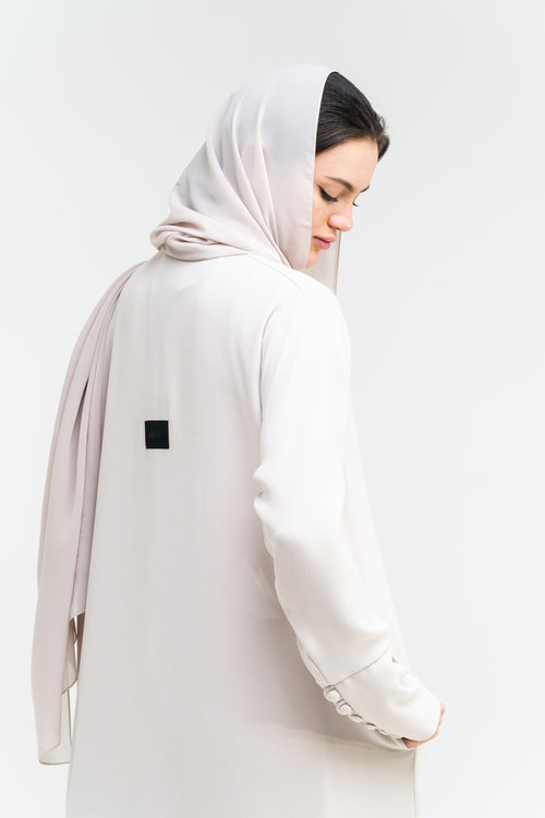 Pearl Button-Front Abaya in Cream Sand – hover image