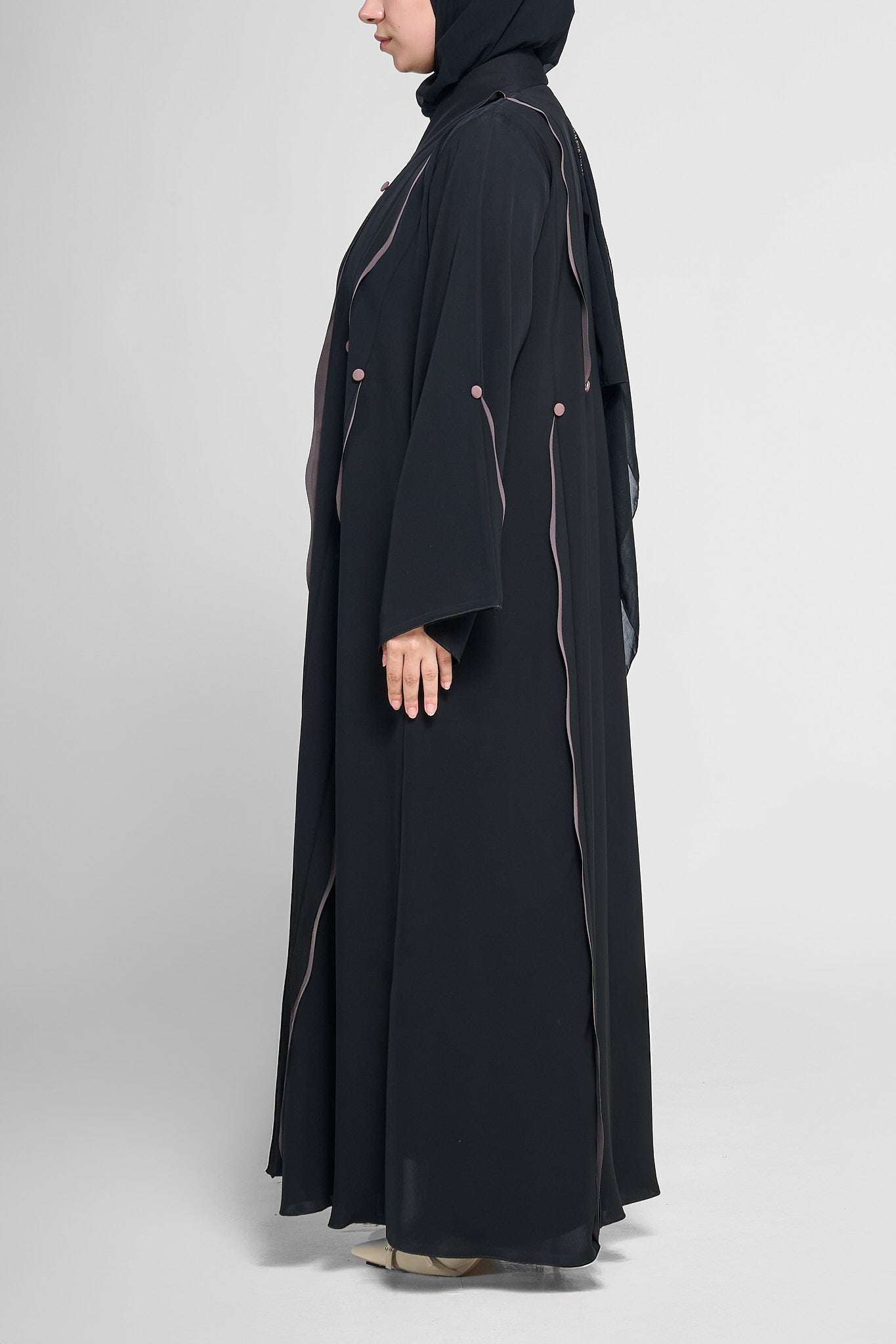 Black Flow-Line Abaya with Contrast Piping and Button Accents
