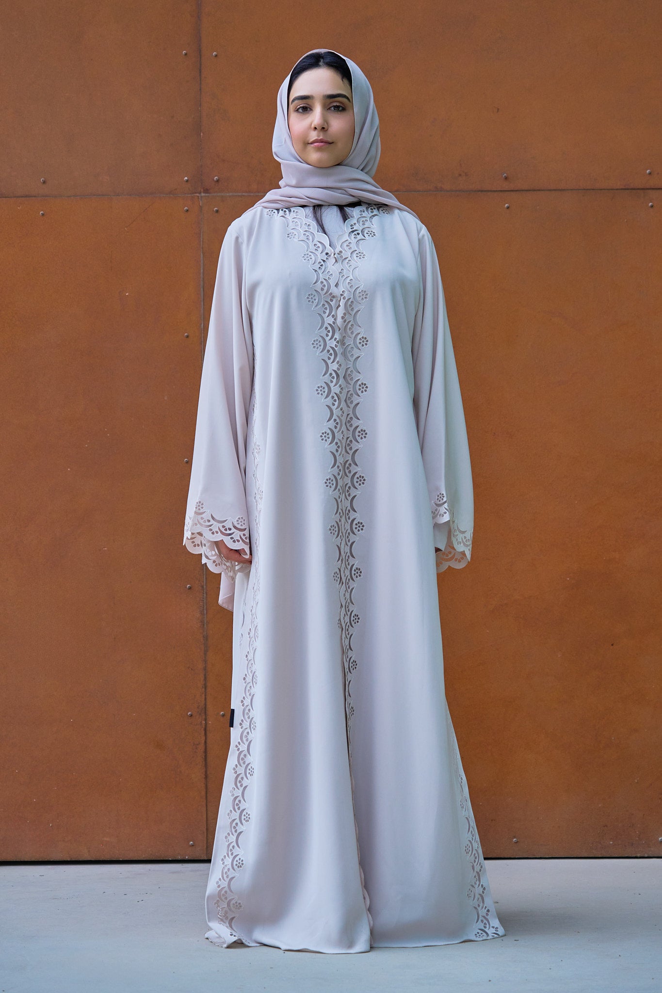 Elegant Nude Abaya with Intricate Laser-Cut Scalloped Panels
