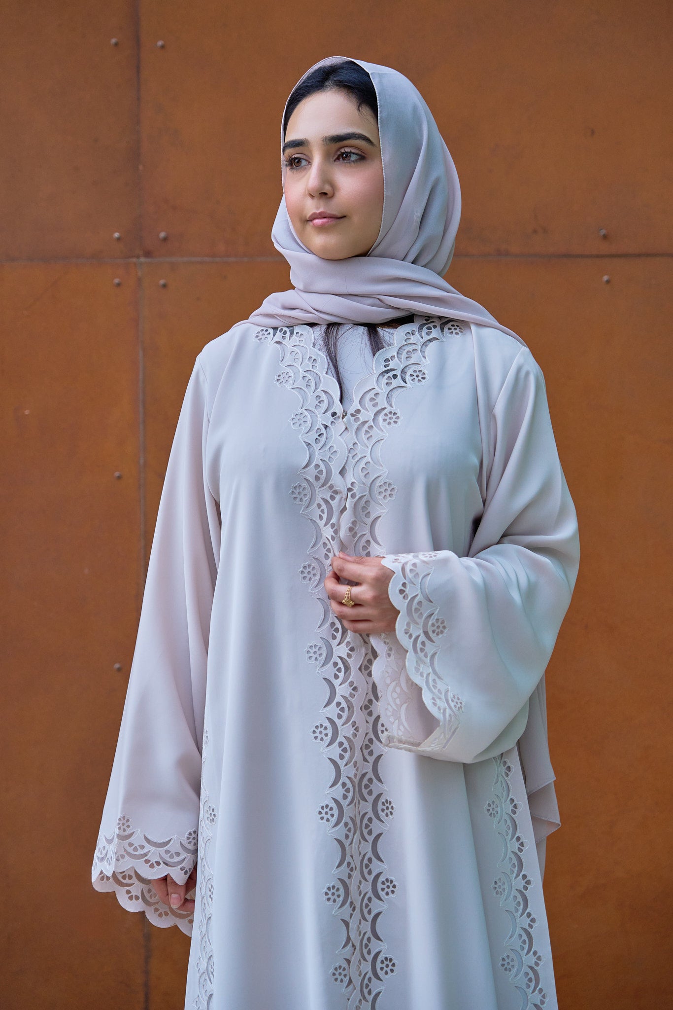 Elegant Nude Abaya with Intricate Laser-Cut Scalloped Panels