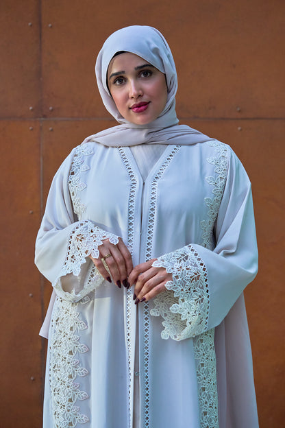 Elegant White Lace-Trim Abaya with Intricate Side Floral Embroidery