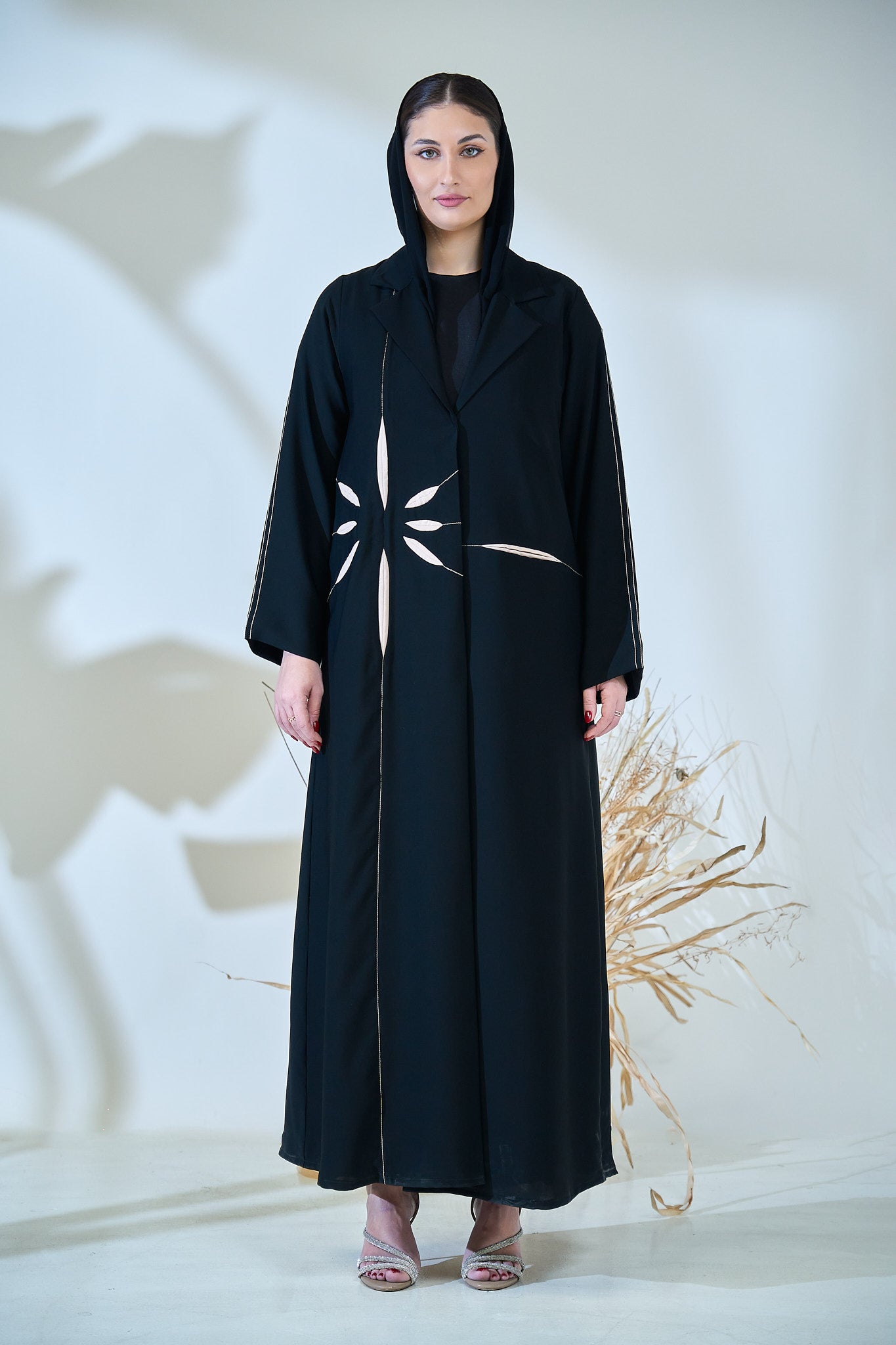 Black Abaya with Abstract Cut-Out Sunburst Design