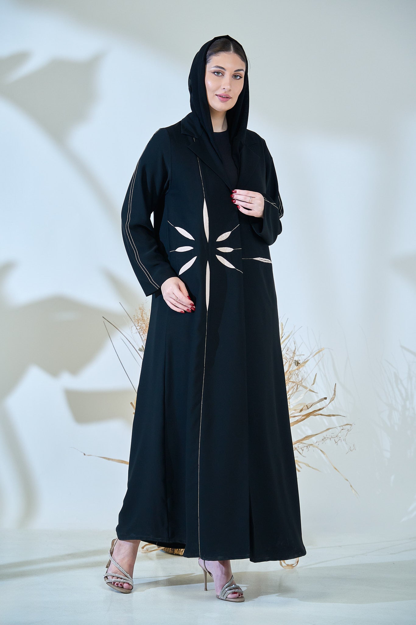 Black Abaya with Abstract Cut-Out Sunburst Design