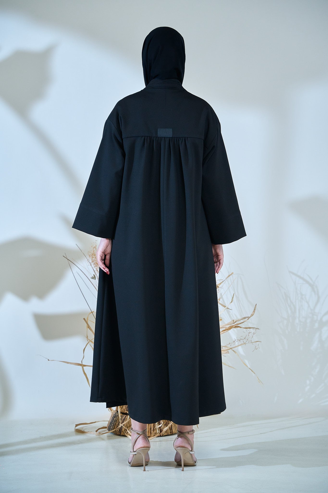 Minimalist Structured Black Abaya with Wide Sleeves & Clean Panel Detailing