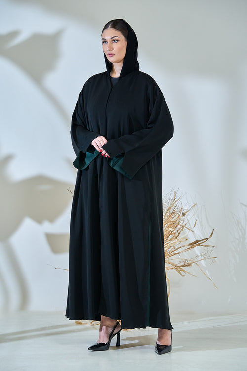 Minimalist Black Abaya with Deep Green Inner Sleeve Contrast – hover image