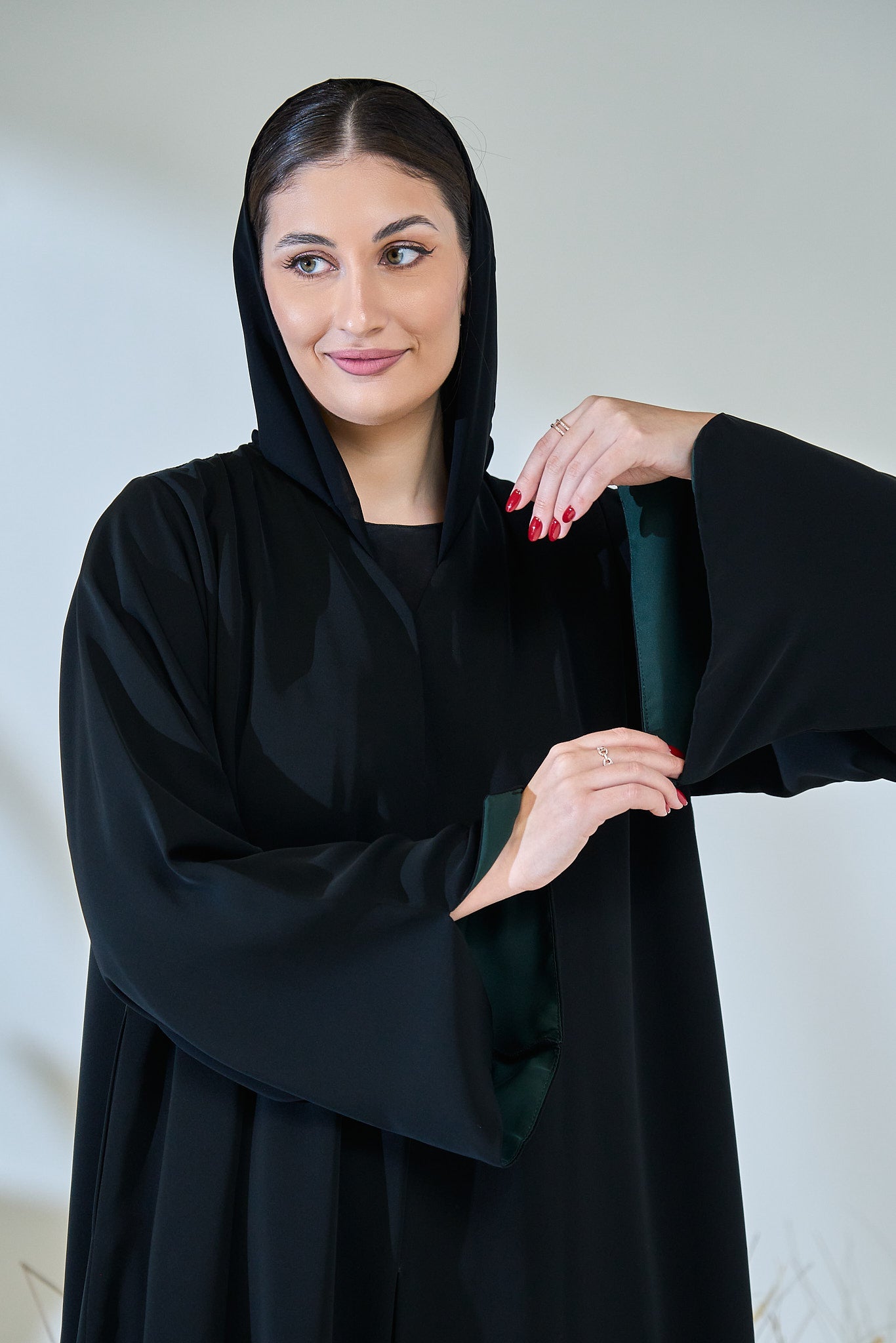 Minimalist Black Abaya with Deep Green Inner Sleeve Contrast