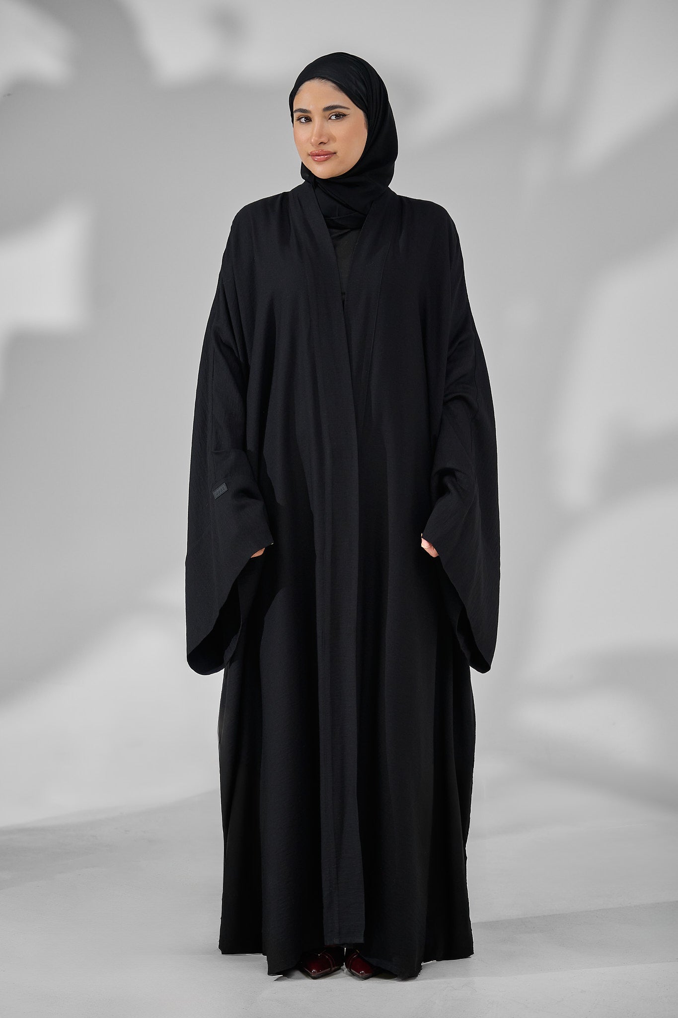 Classic Black Minimal Kimono Abaya with Wide Flowing Sleeves & Hidden Side Pockets