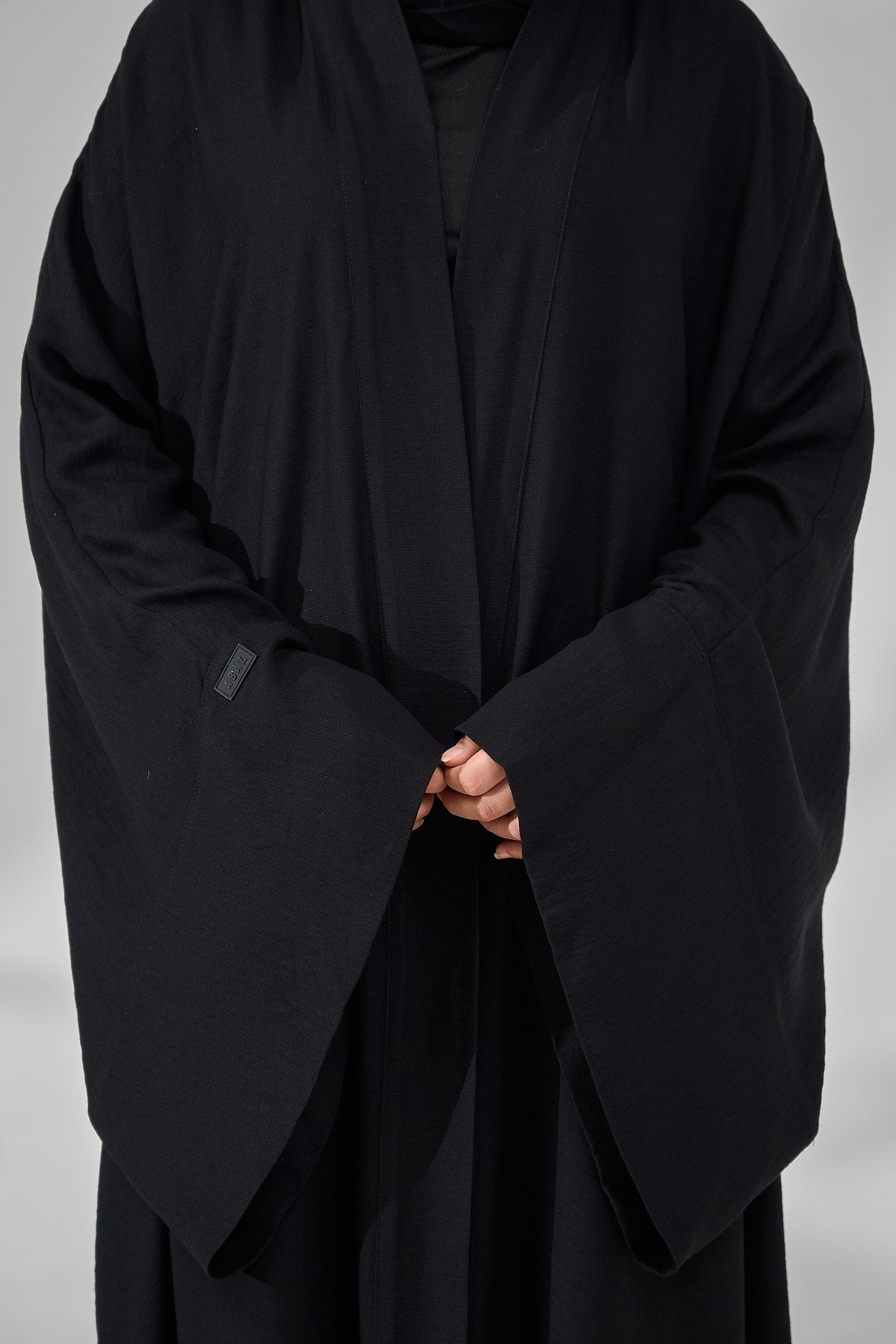Classic Black Minimal Kimono Abaya with Wide Flowing Sleeves & Hidden Side Pockets