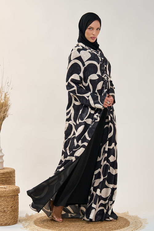 Printed Closed Abaya with Front Tie Detail and Flowing Silhouette – hover image