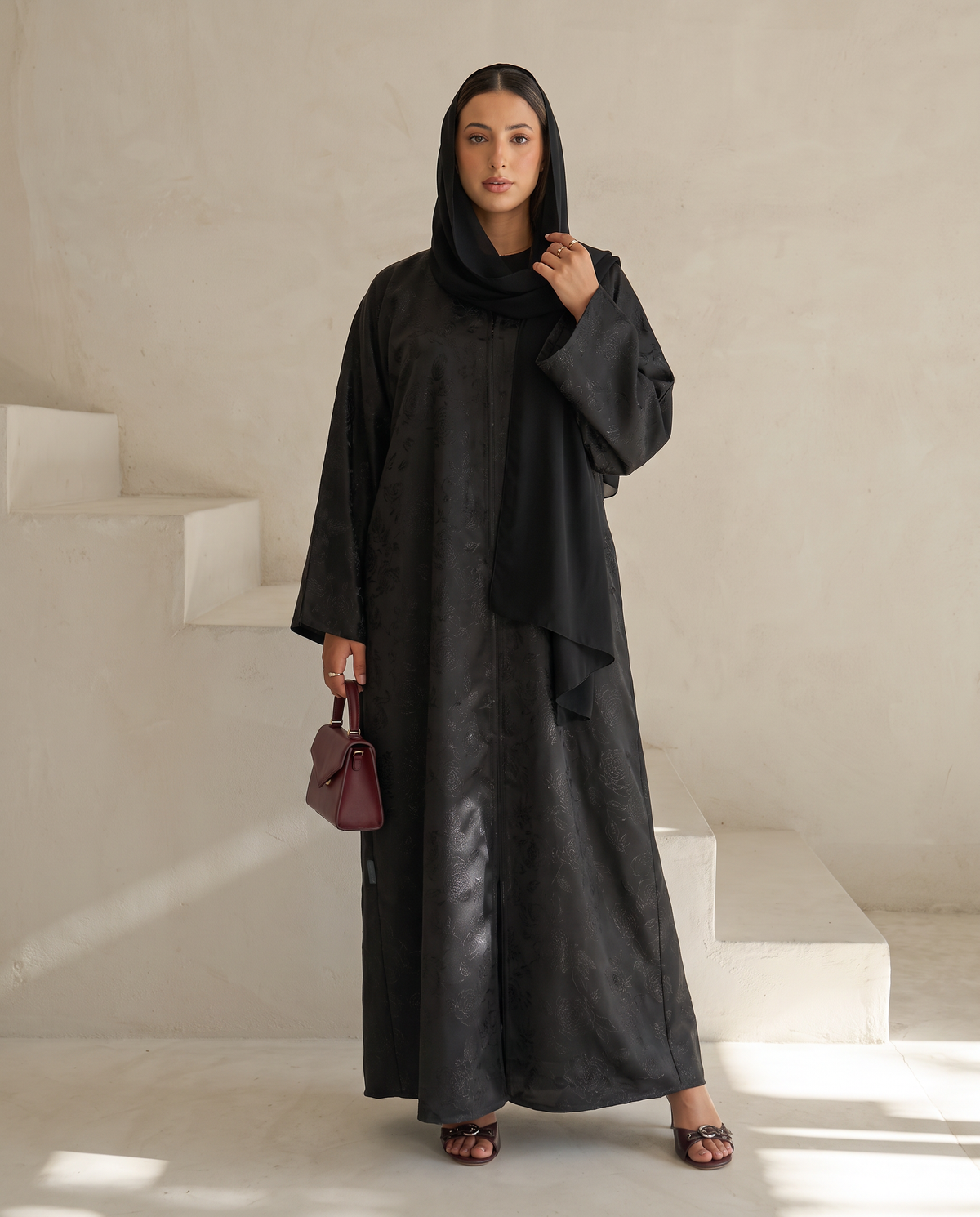 Black Textured Abaya with Subtle Floral Detailing