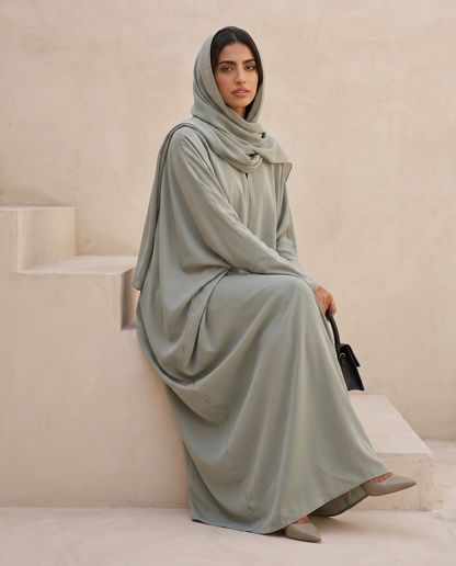 Modern Loose-Cut Mint Green Abaya with Sculpted Draping
