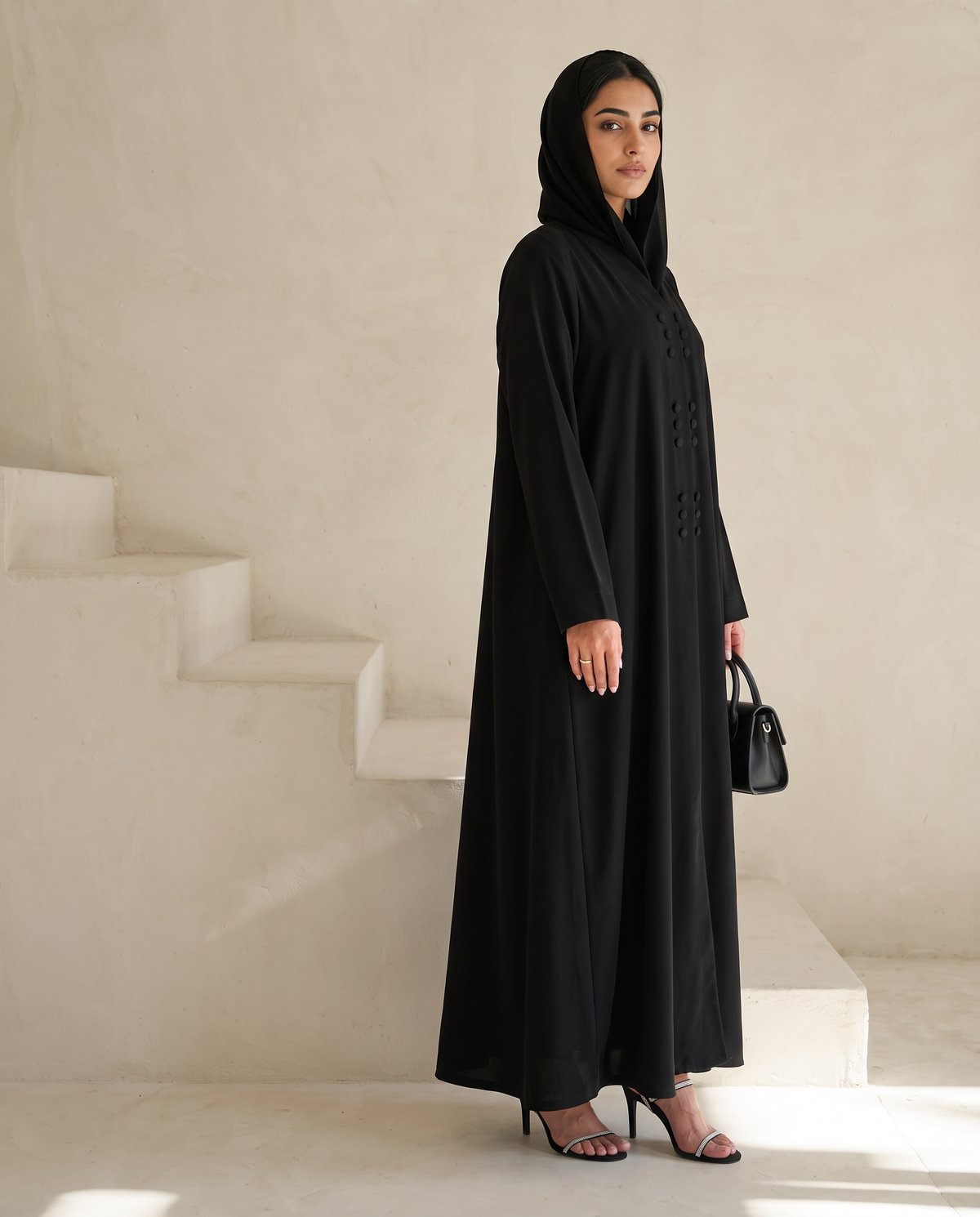 Elegant Minimalist Black Abaya with Vertical Button Accents