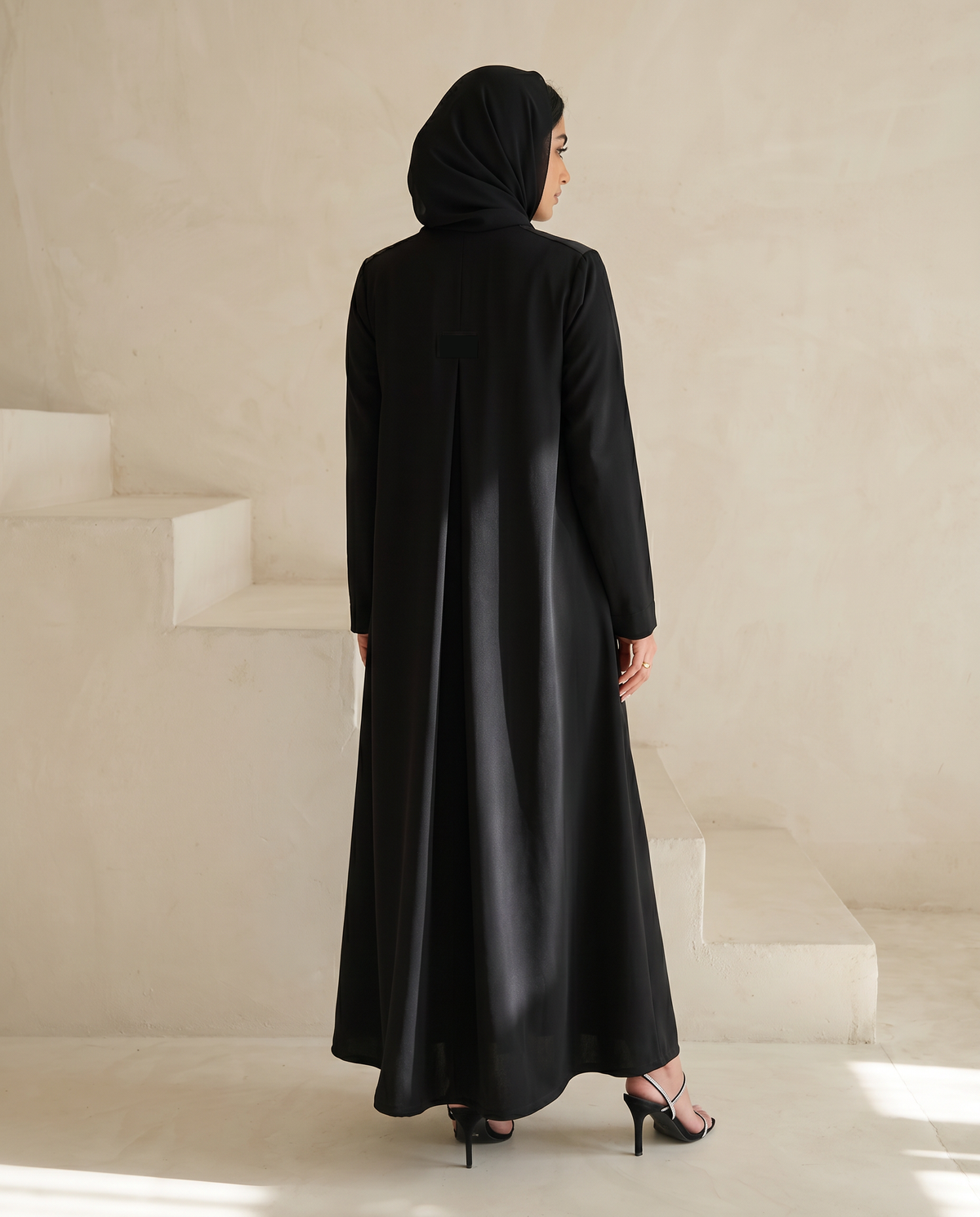 Elegant Minimalist Black Abaya with Vertical Button Accents