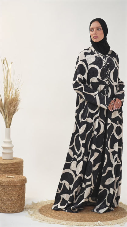 Printed Closed Abaya with Front Tie Detail and Flowing Silhouette